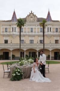Outdoor wedding reception with spiral table layout at Castle of Viñuelas
